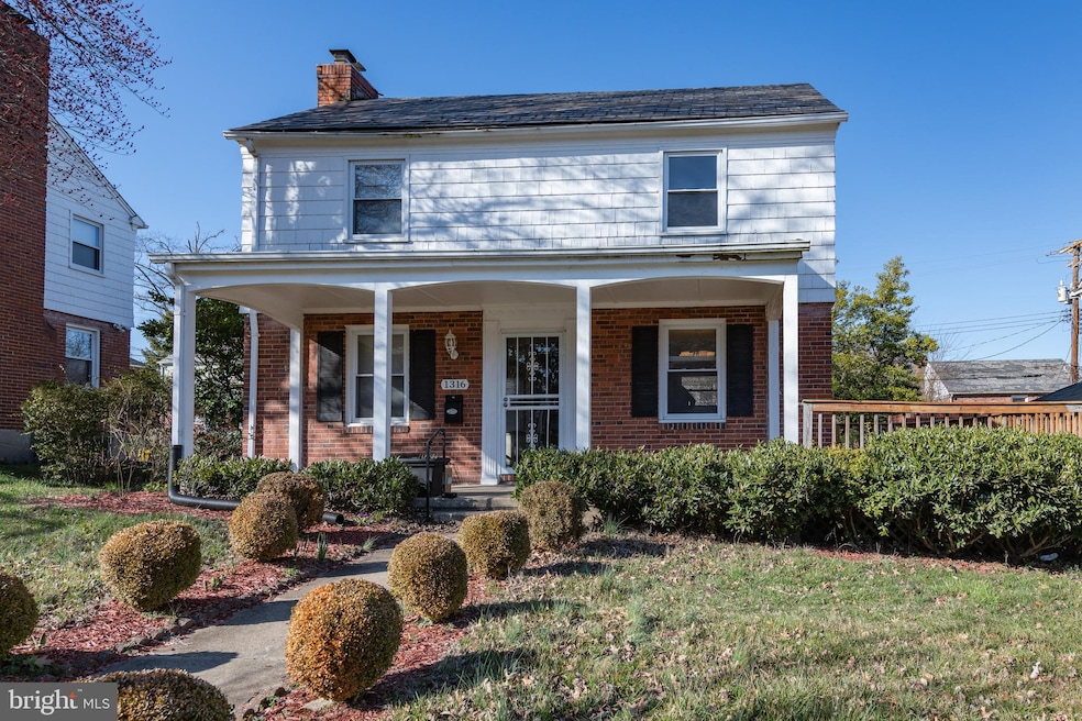 1316 E 35th St, Baltimore, MD 21218 - photo 1