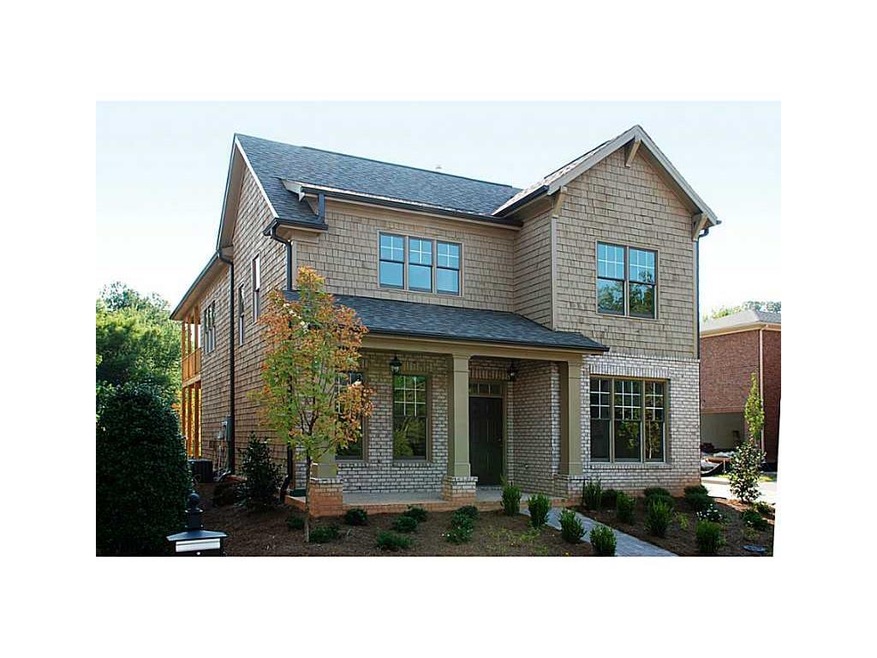 Exterior Front. Beautiful Brick and real cedar sha