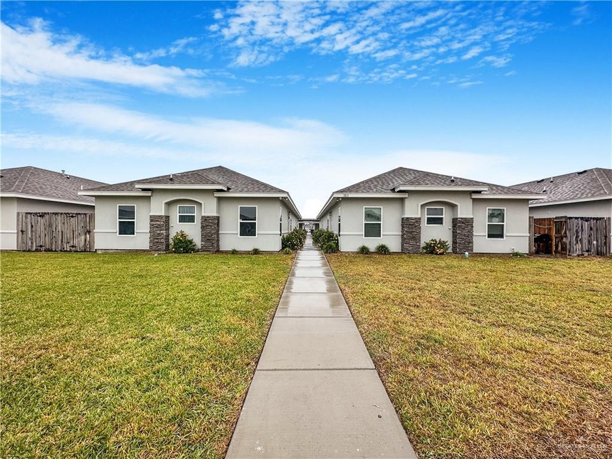 Ranch-style house with a front lawn