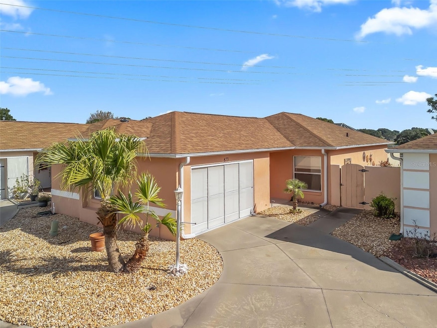 873 Oviedo Rd, Lady Lake, FL 32159 - photo 1