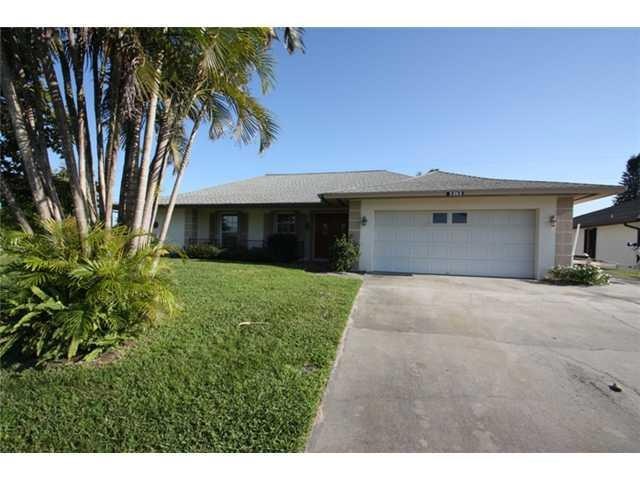 Exterior Front. accordian shutters on most of home