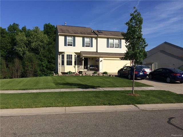 FRONT VIEW OF HOME W/ADDITIONAL LOT - NOTICE FIELD
