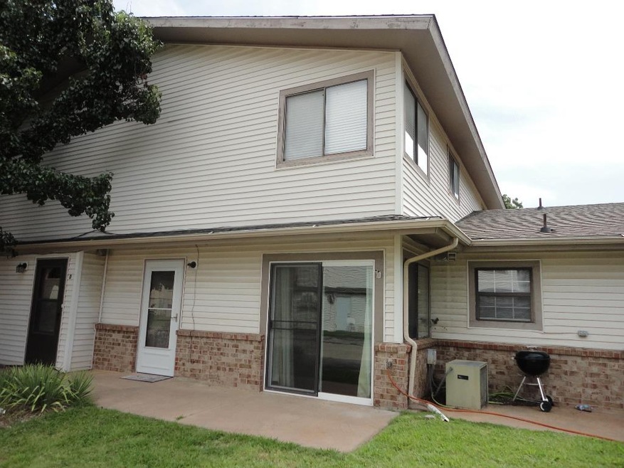 Front of Condo.  White storm door, and double slid