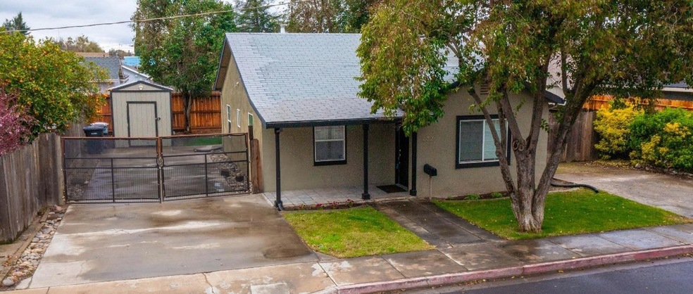 Plenty of room to park a boat or trailer.  Large shed for storage.