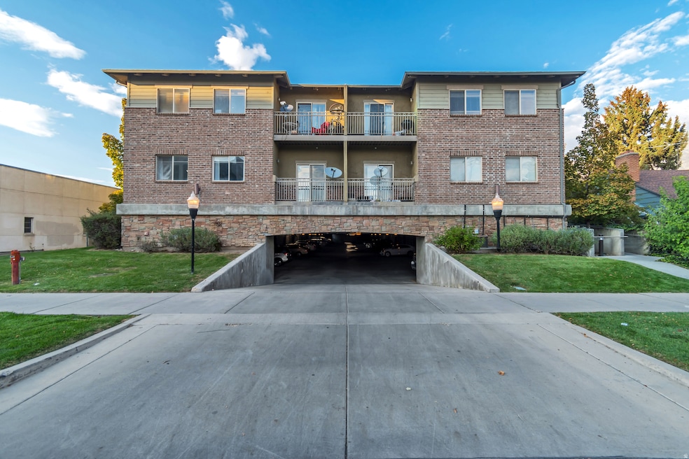 View of property with concrete driveway
