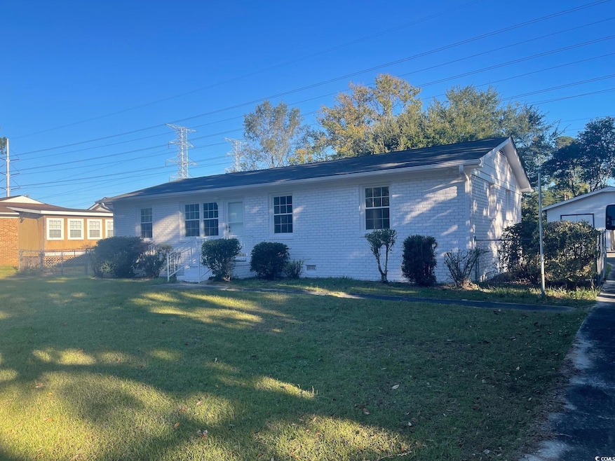 Back of property with brick siding