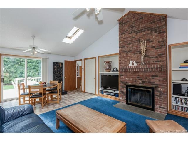 Grand Room with floor to ceiling fireplace, vaulte