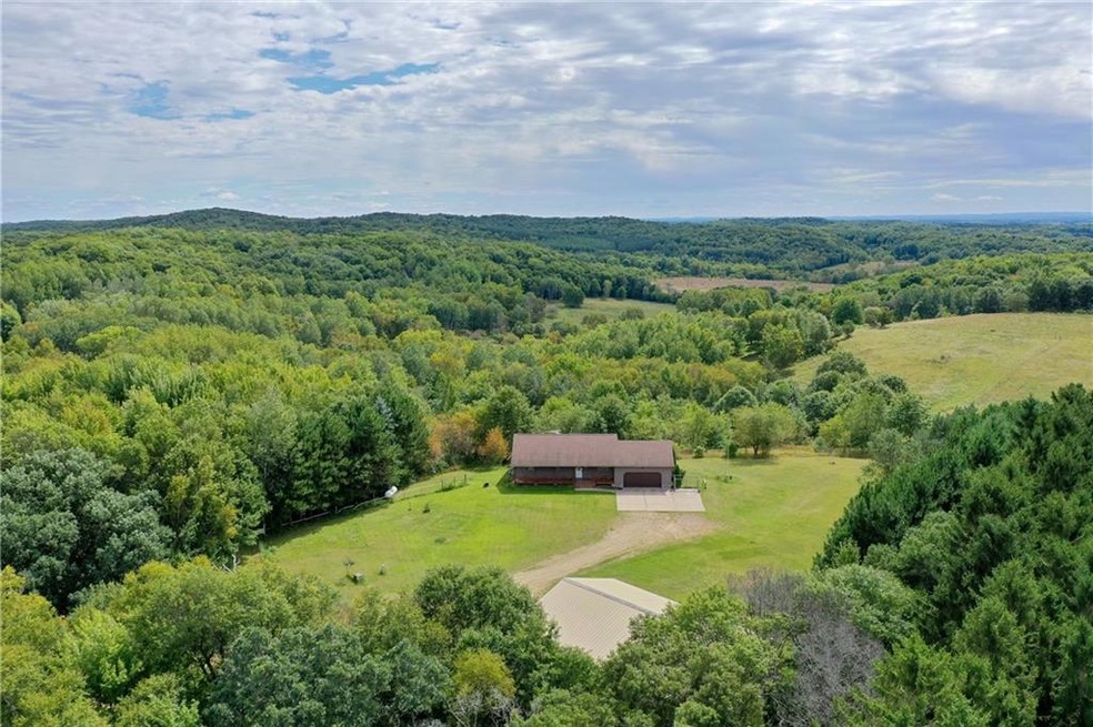 UNIQUE & PRIVATE COUNTRY HOME with 67.8 acres of r
