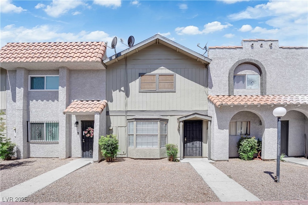 Mediterranean / spanish-style home with a tile roo