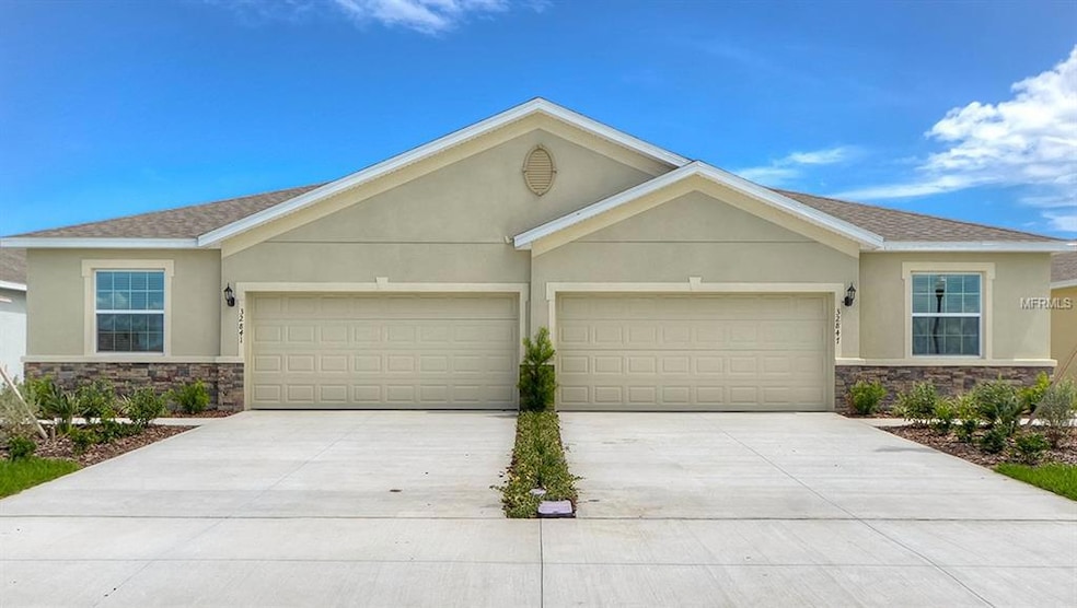 7703 Timberview Loop, Wesley Chapel, FL 33545 - photo 1