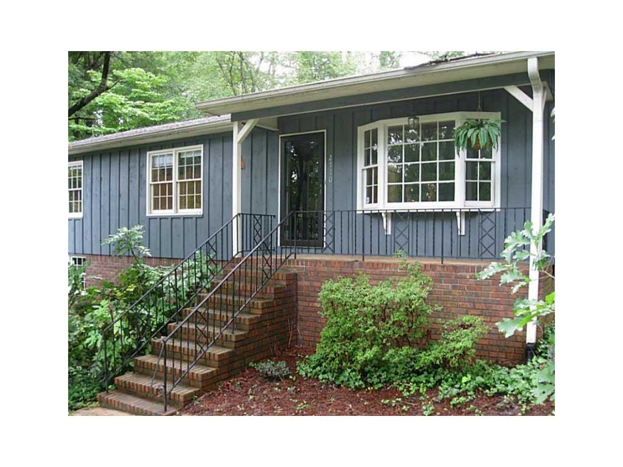 Exterior Front. charming home with covered front p