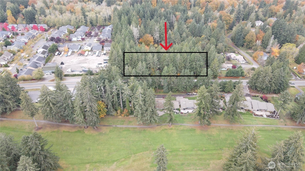 2.5 Acres with 3 homes.  This is right across the street from Golf Course.