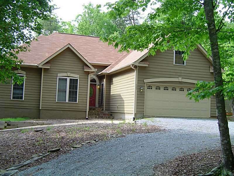Facade/Exterior Front. Front view  of this ranch h