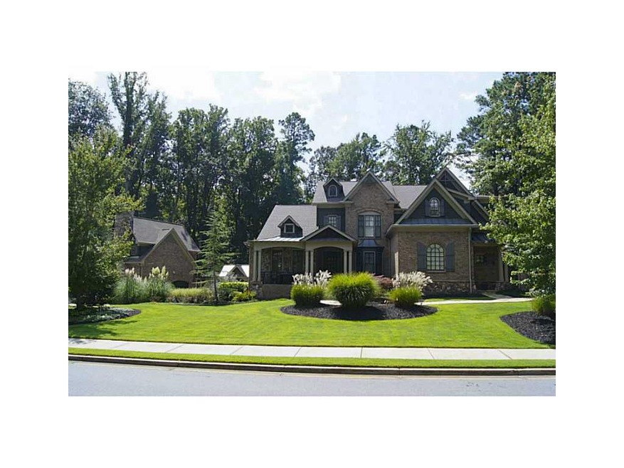 Exterior Front. Beautifully landscaped double lot 
