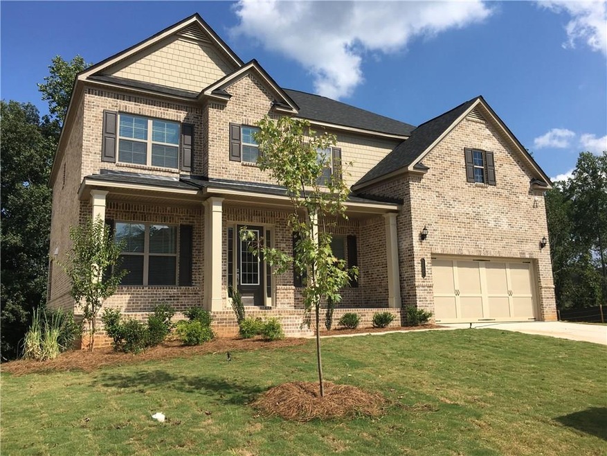 Gorgeous 4 sides brick home with front porch!