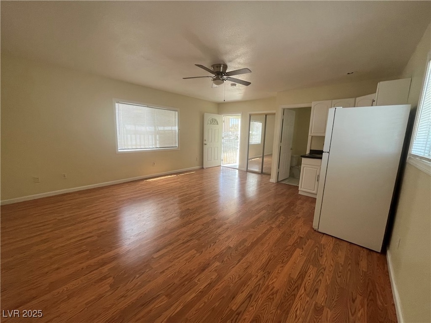 Spare room featuring baseboards, a healthy amount