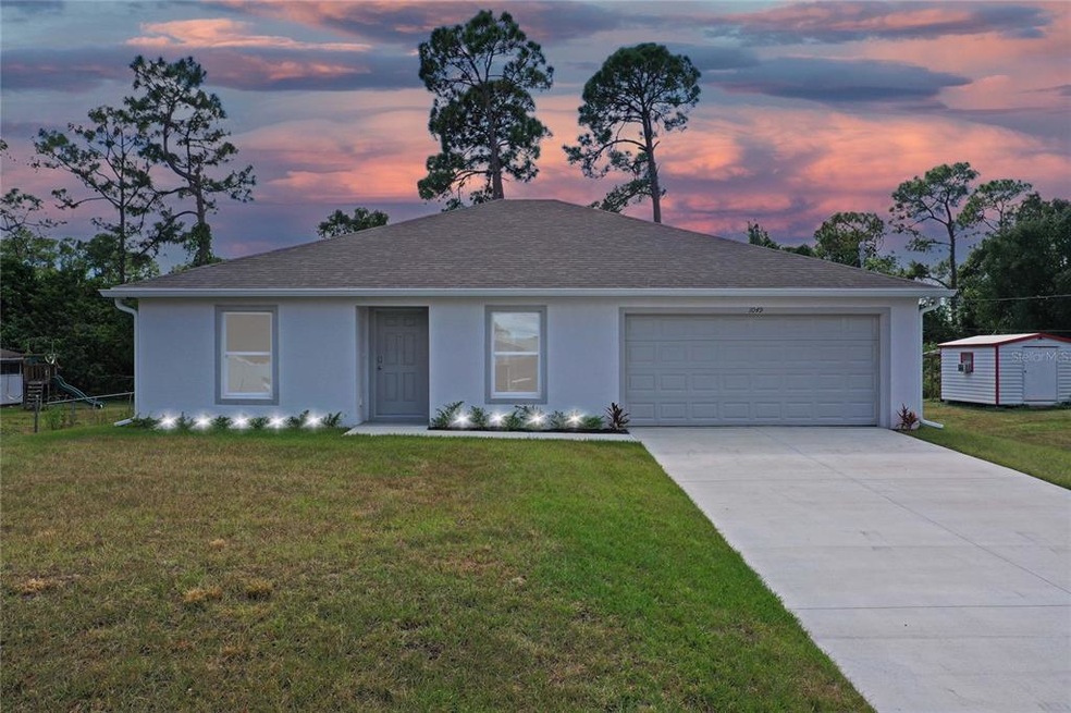 1049 Tropical Ave NW, Port Charlotte, FL 33948 - photo 1