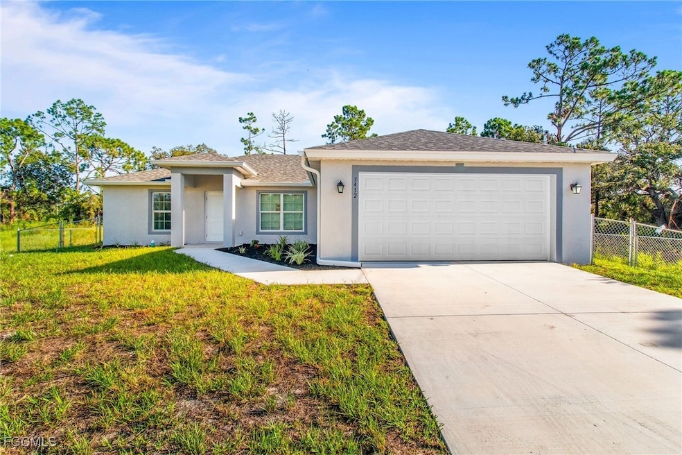 Ranch-style house with stucco siding, concrete driveway, a garage, and roof with shingles