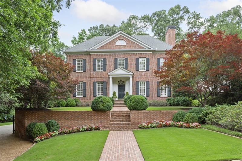 Classic brick traditional home located in the hear