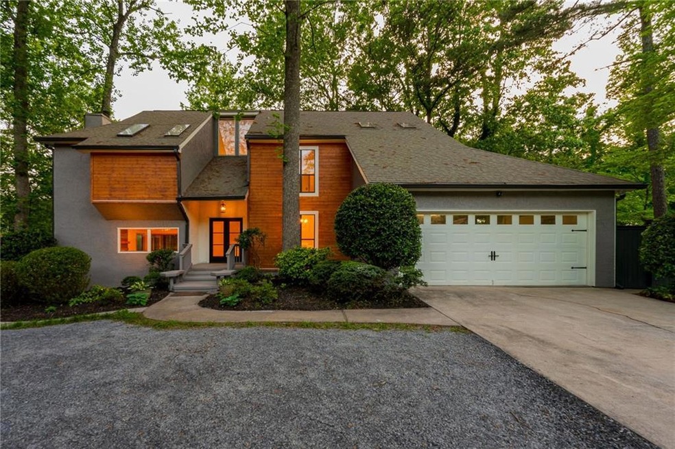 View of front of property featuring a garage