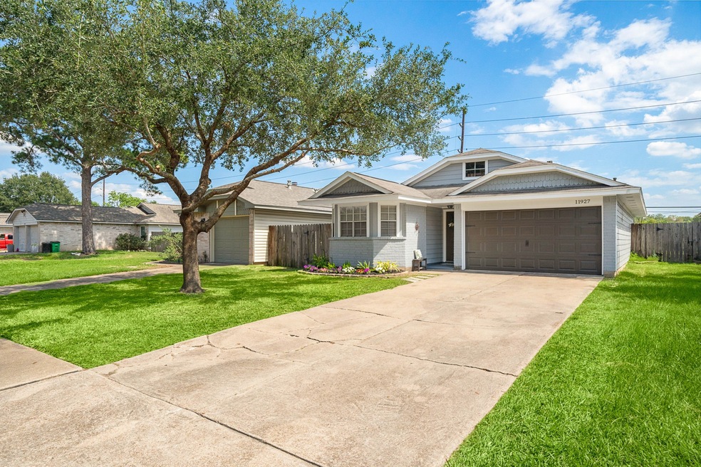 Beautiful oak shade tree in front yard.