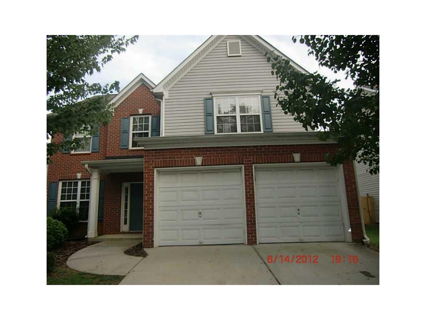 Exterior Front. Brick Front with vinyl siding