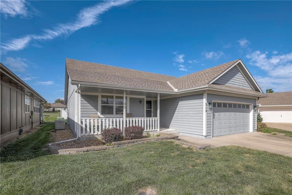 512 S Poseidon Way, Raymore, MO 64083 - photo 1