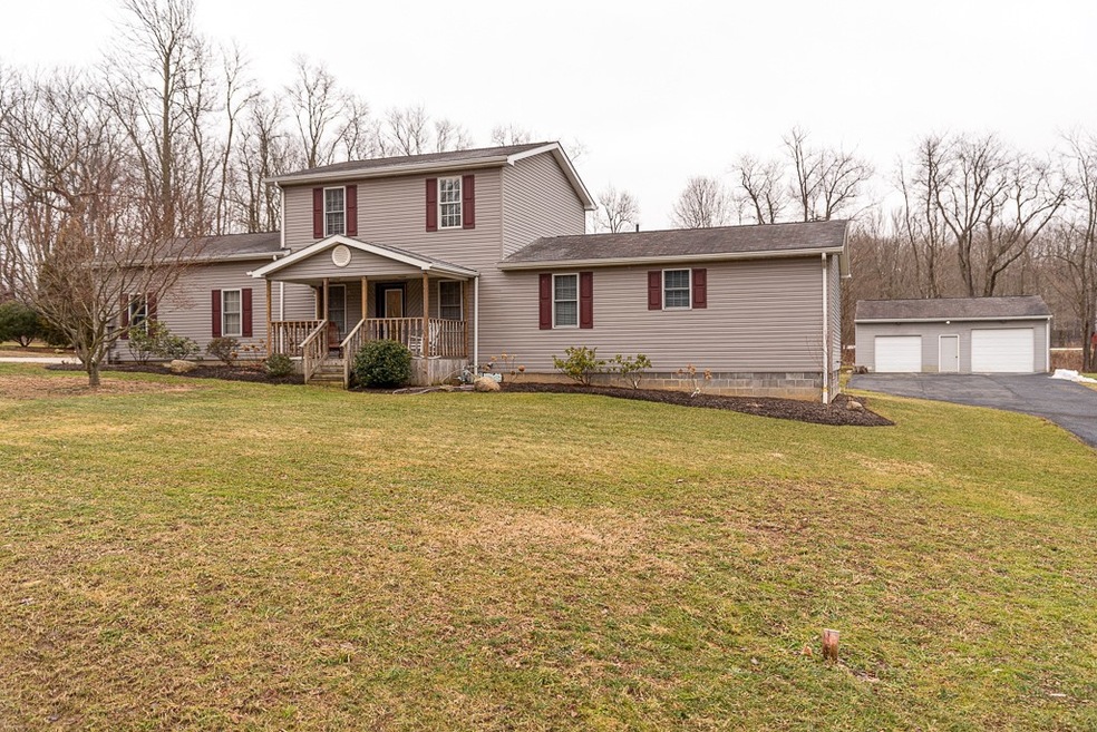 Vinyl-sided, 2 story home on 1.4 acres