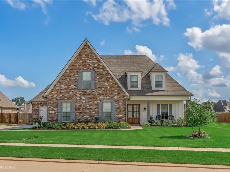View of front of home featuring a front lawn