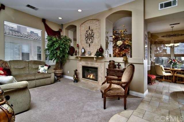 Elegantly Designed Living Room with Fireplace