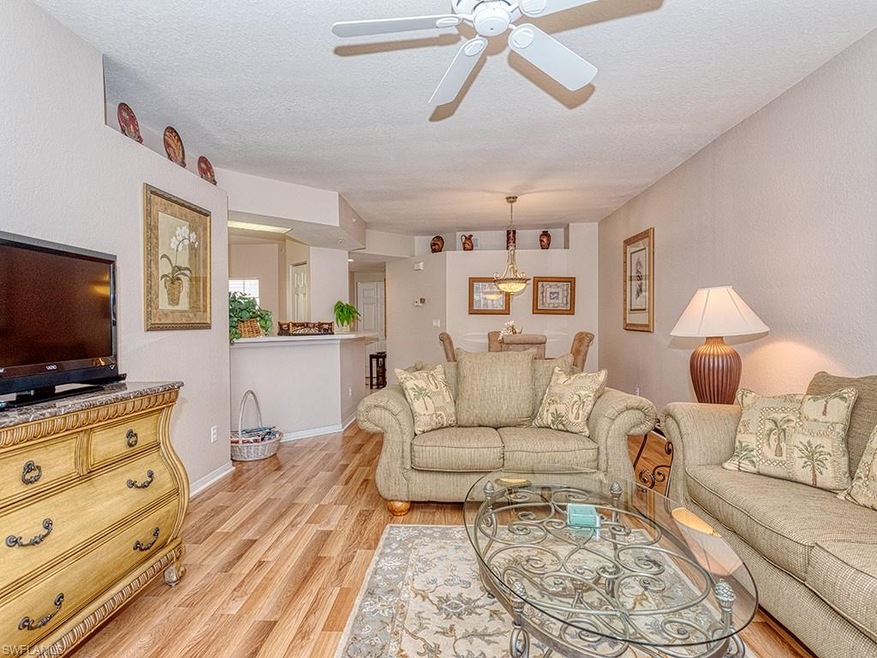 Living room open to dining room and kitchen