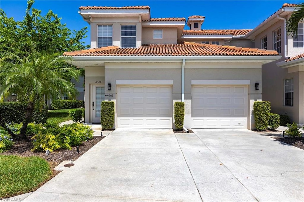 Mediterranean / spanish house featuring concrete driveway, stucco siding, a garage, and a tile roof