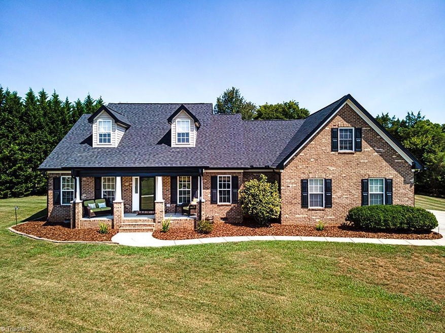Move in Ready home with water views from the covered front porch. This home sits on over 1.5 acres of land!