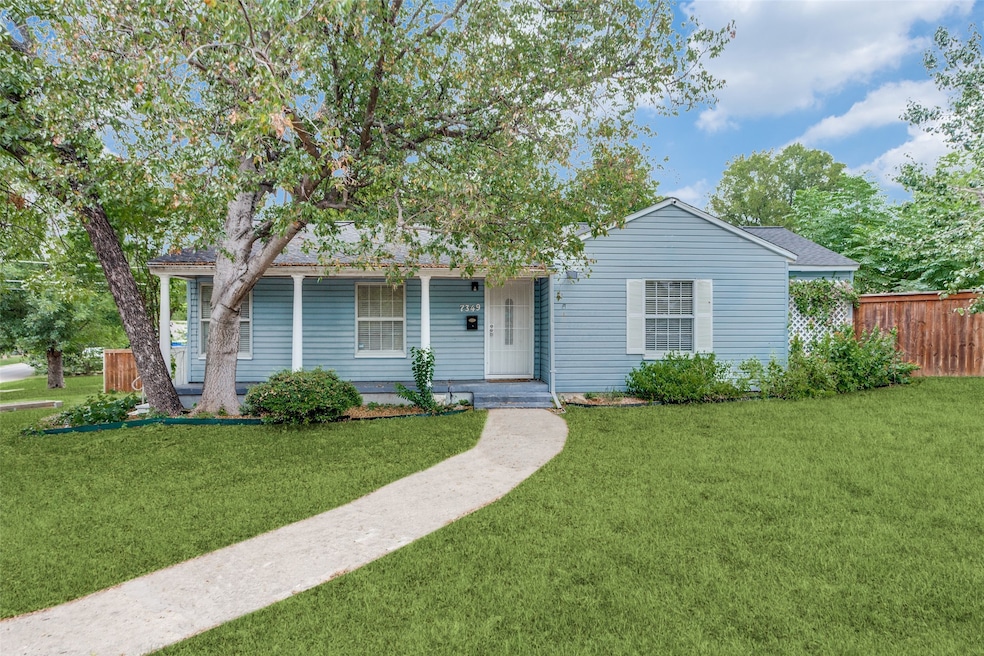 View of front of house with a porch and a shingled roof