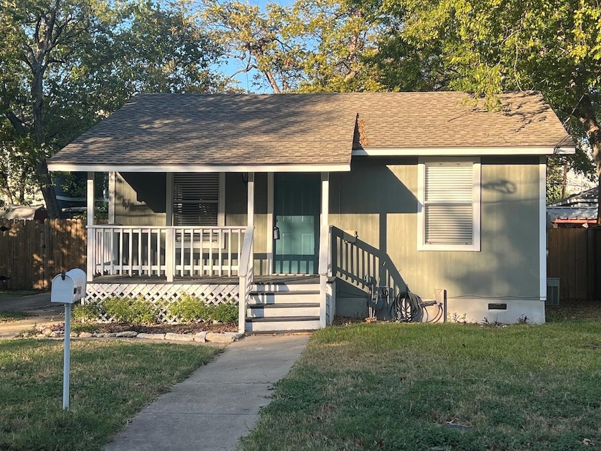 View of front of home with roof with shingles, cr