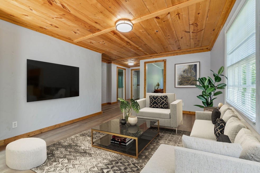 Living area digitally staged.  Add your personal touch to it.