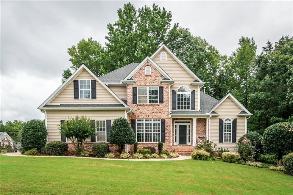 Craftsman-style house with a front yard