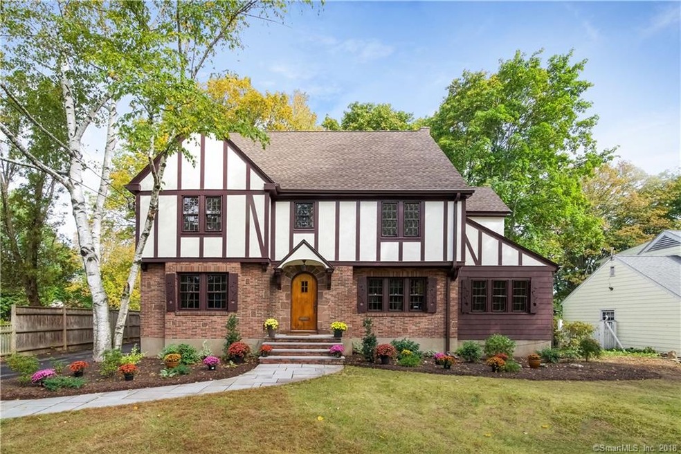 Welcome home to this charming vintage tudor.  Come