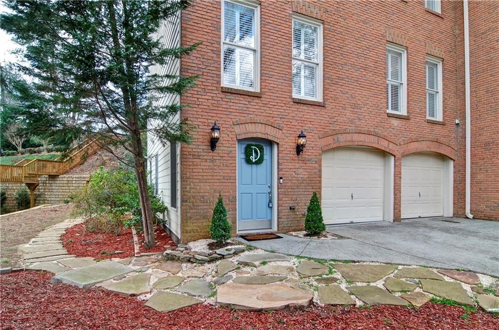 Welcome home to this lovely brick front townhome i