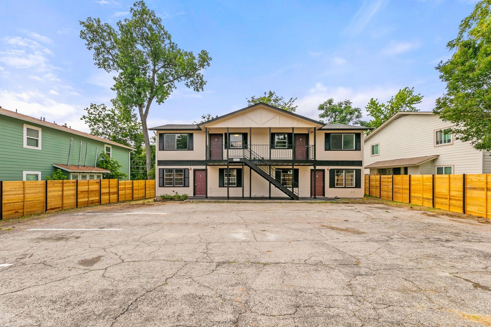 Multi unit property with stairway, uncovered park