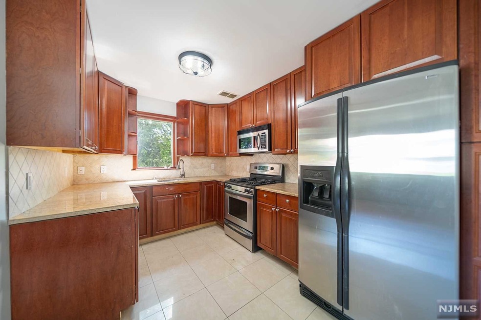 242 Berkshire Rd unit Top Flr, Hasbrouck Heights, NJ 07604 - photo 1