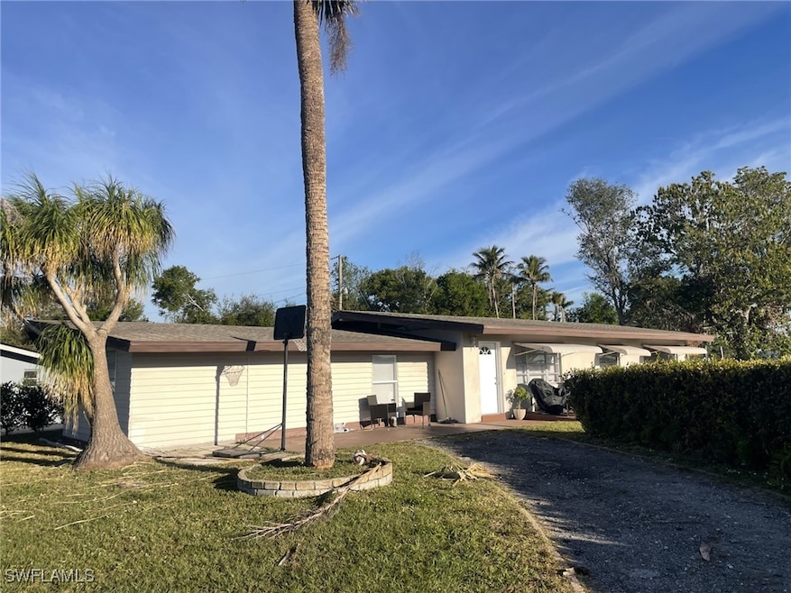 View of front of property featuring a front yard