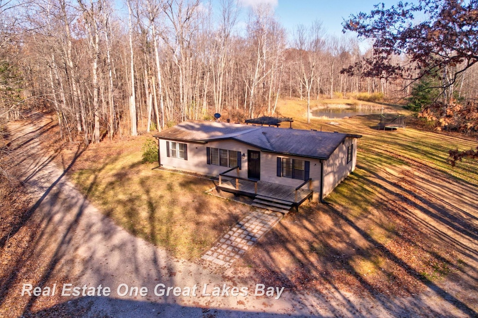 7454 N Jefferson Rd, Rhodes, MI 48652 - photo 1