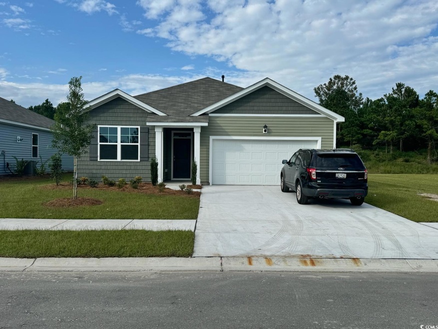 View of front of home featuring a front yard and a