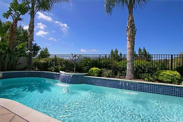 Beautiful pool with waterfall feature and panorami