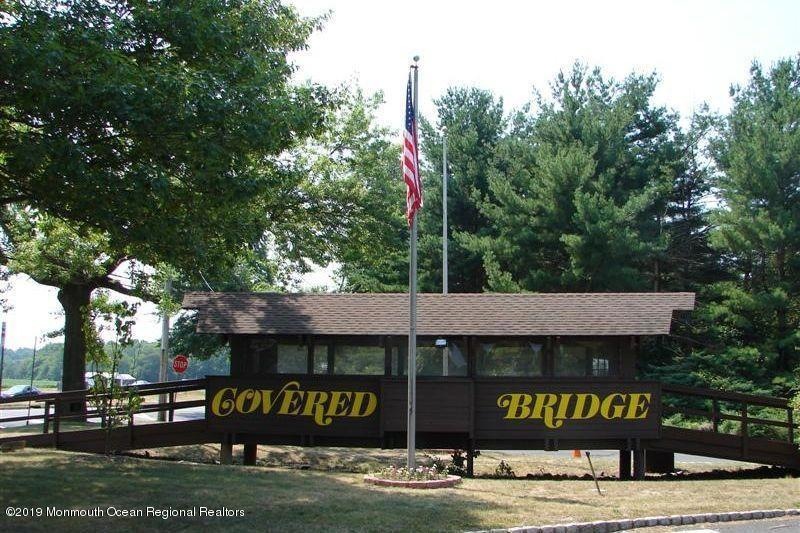 covered bridge community sign