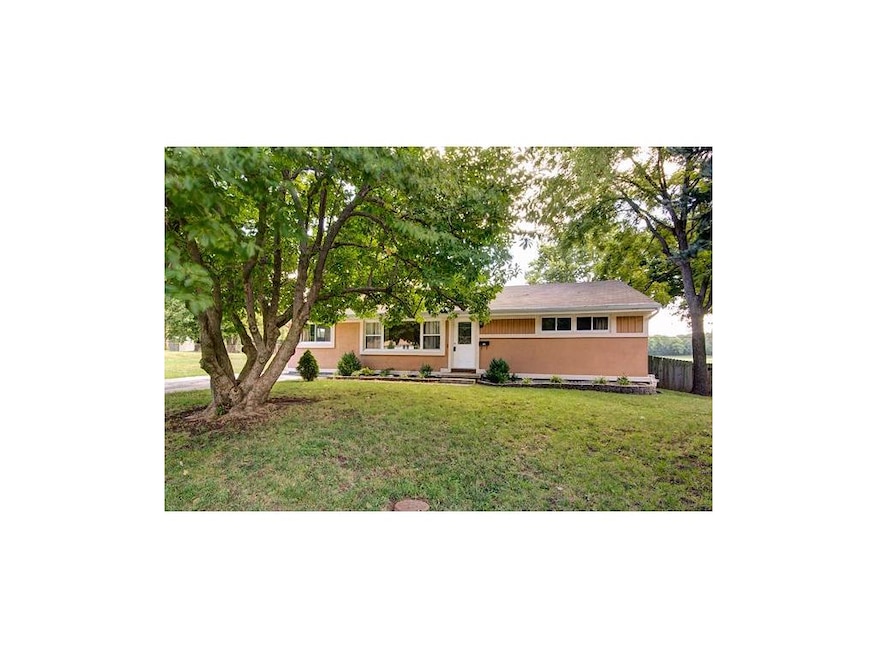 Remodeled ranch with detached 2-car garage.