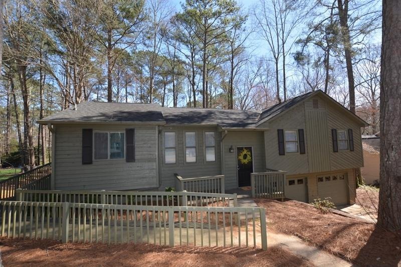 Beautiful home nestled on large, wooded lot
