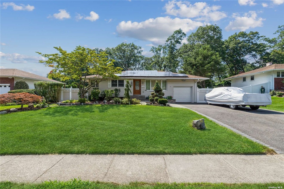 94 Marie Crescent, ComMacK, NY 11725 - photo 1