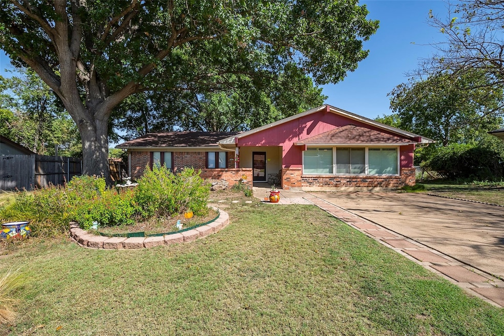 Front of home with off street parking and beautifu